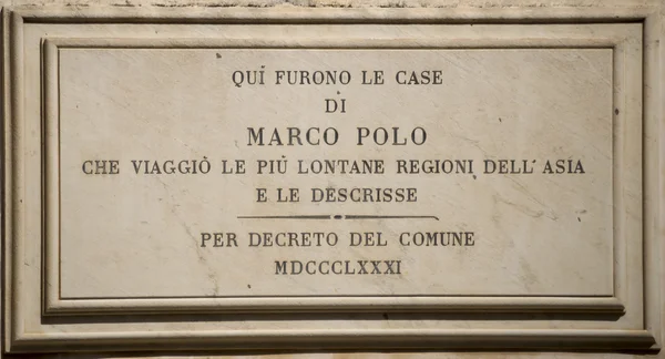 The memorial plaque on the house where he lived Marco Polo