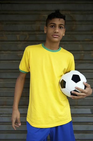 Young Brazilian Football Player Holding Soccer Ball