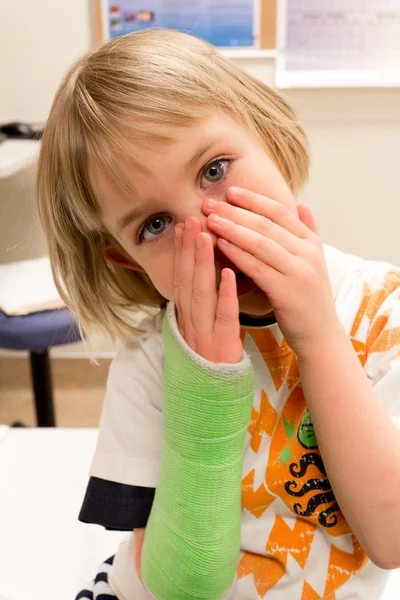 Little Girl Waits to Have Arm Cast Removed
