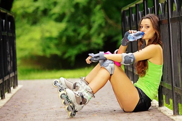 Woman roller skating sport activity in park