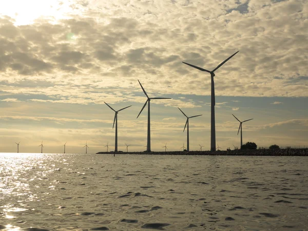 Wind turbines power generator farm in sea
