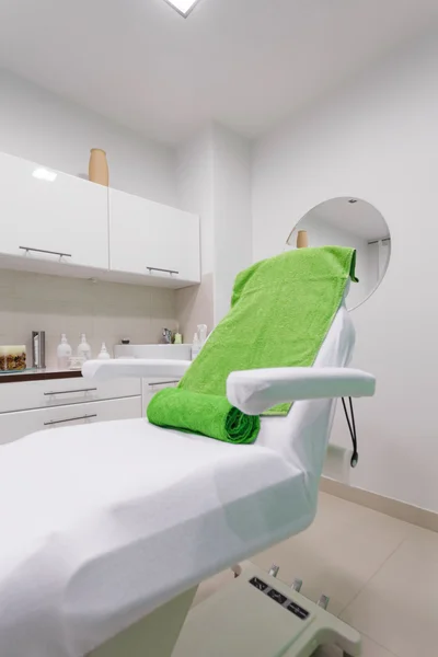 Chair in modern healthy beauty spa salon. Interior of treatment room.