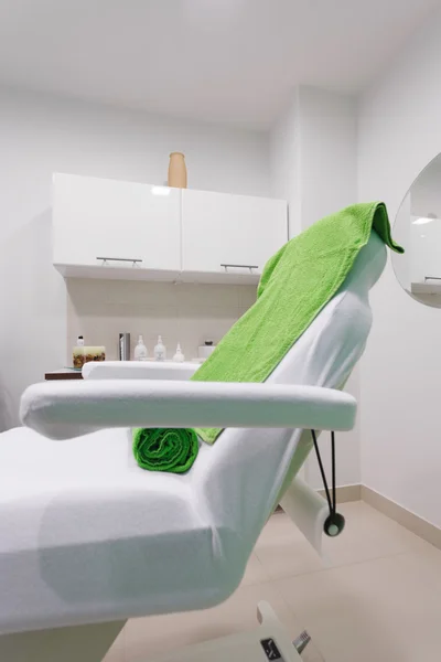 Chair in modern healthy beauty spa salon. Interior of treatment room.