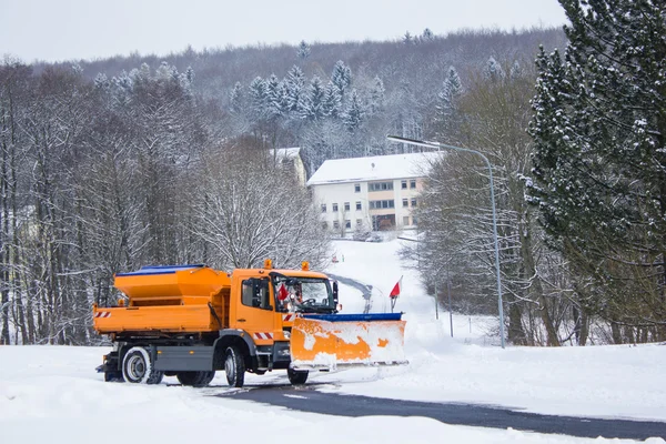 Snow plough truck with salt and grit spreader