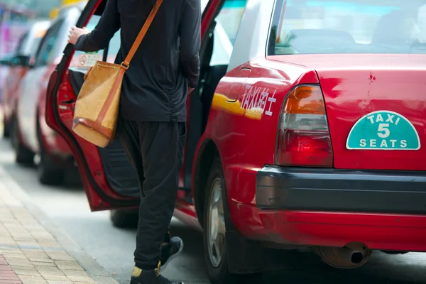 Passenger opened the taxi cab door