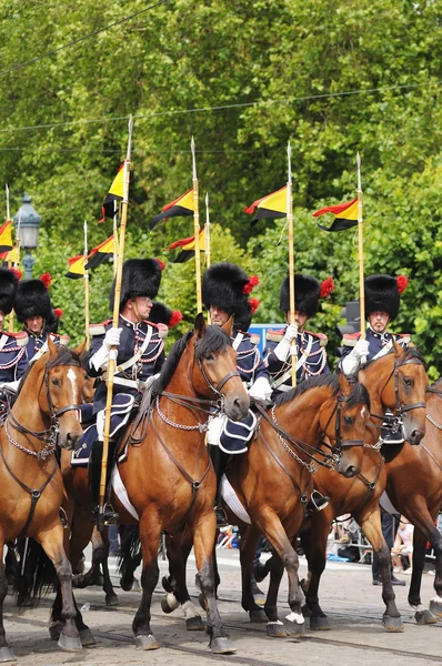 belgian cavalry moves to place des palais during military parade of national day of belgium