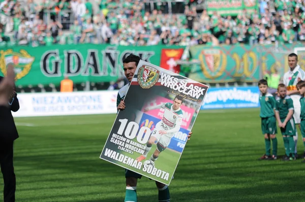 Wroclaw, POLAND - April 21: Match T-Mobile Ekstraklasa between Wks Slask Wroclaw and Lechia Gdansk, Waldemar Sobota with prize on April 21, 2013 in Wroclaw, Poland.