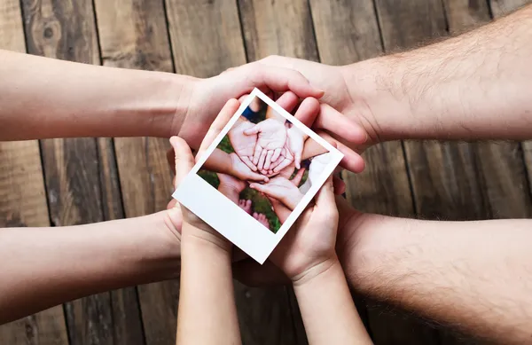 Set of images in family hands