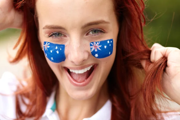 Happy female with australian flag, isolated