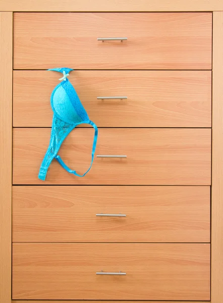Blue bra in dresser
