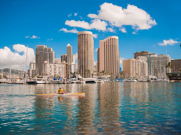 HONOLULU, HAWAII - FEB 2: View of Waikiki Yacht club from Ala Moana beach park with buildings behind