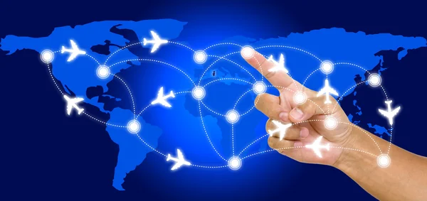 Hand point on airline route with world map background