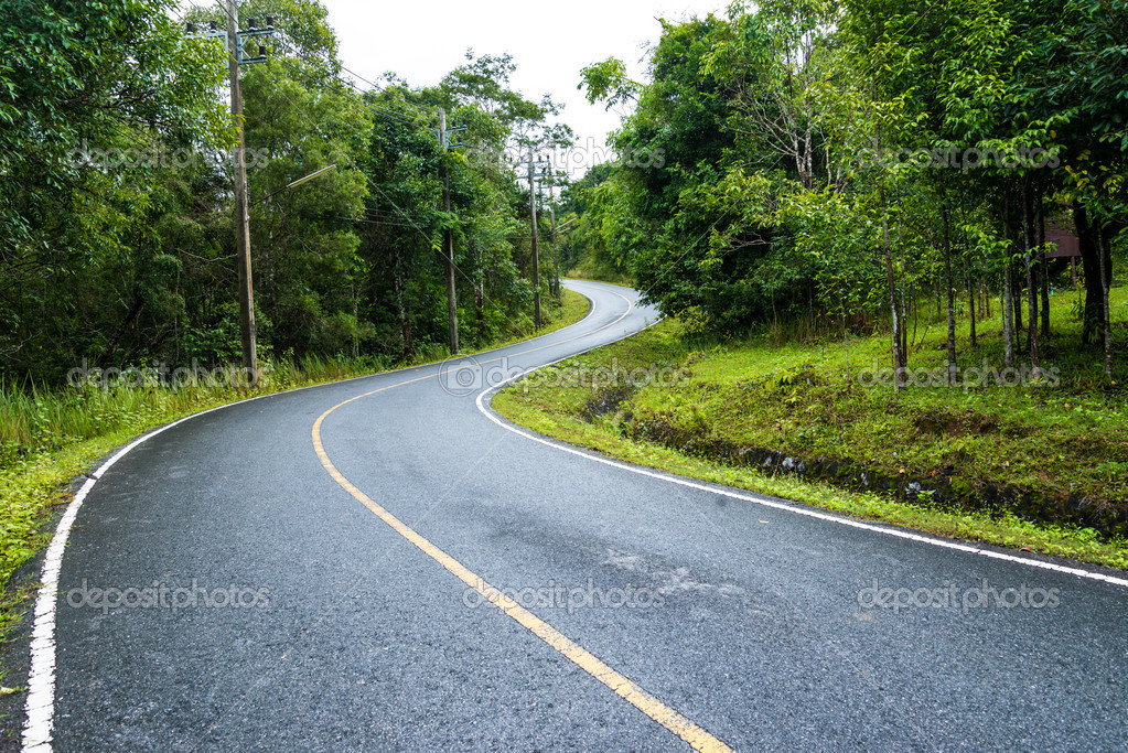 depositphotos_39981583-Curve-way-of-asphalt-road-through-the-green-field.jpg