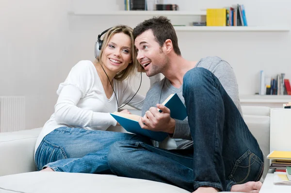 Young couple listening music together