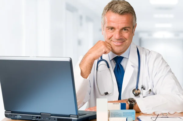 Doctor working in office
