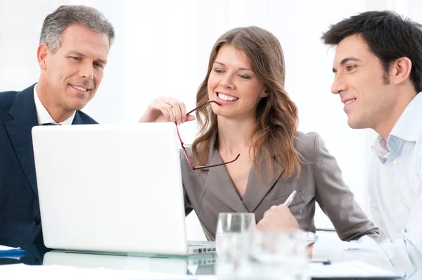 Working together at laptop — Stock Photo #12766770