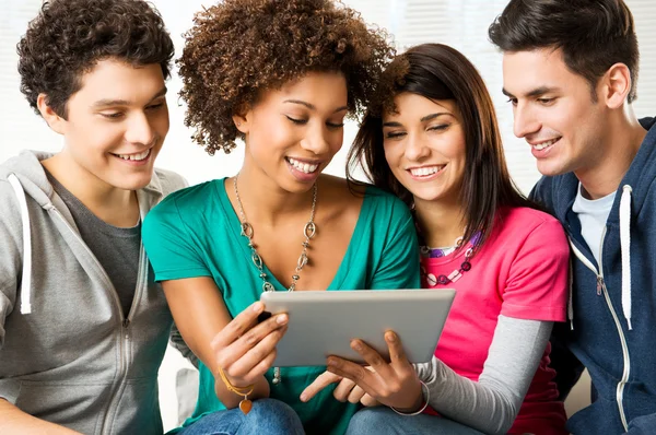 Friends Enjoying Digital Tablet