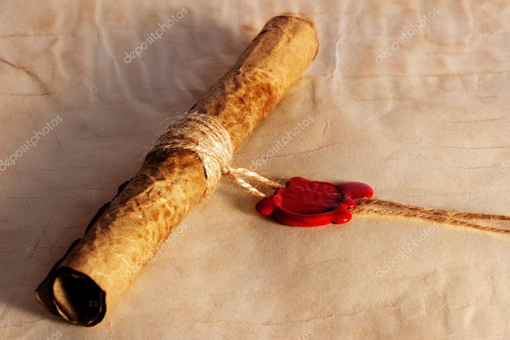 Old paper, ancient parchment scroll, envelope with wax seal and quill