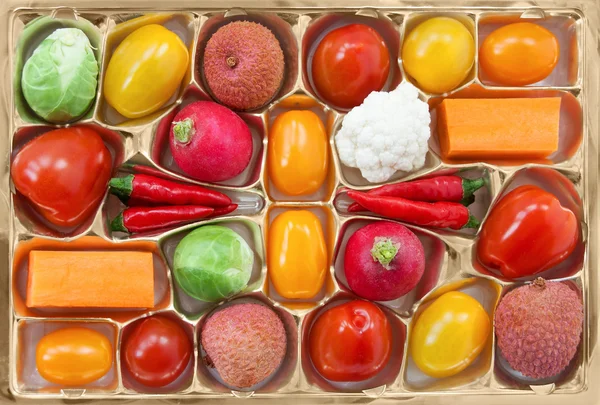 Chocolate box with vegetable and fruit