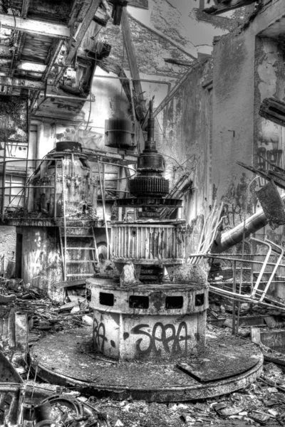 Abandoned factory with demolished turbines (black-and-white)