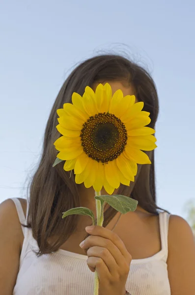 Valentina with a sunflower