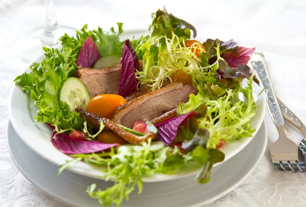 Smoked duck with pomegranate salad