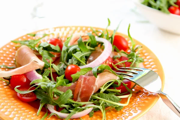Prosciutto with rocket salad