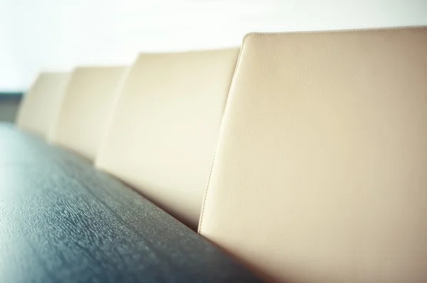 Chairs in conference room, close up and shallow depth of field -