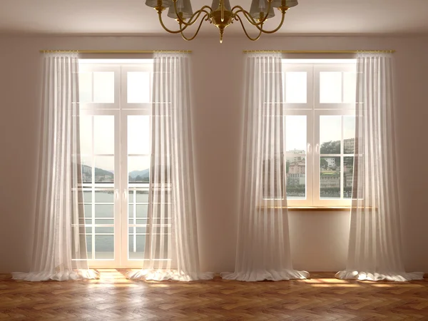Room with windows and balcony door
