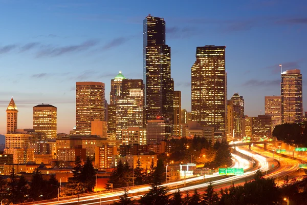 Cars and Vehicle Traffic Tavel Along Interstate 5 Through Downtown Seattle