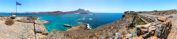 Panorama of Gramvousa , westernmost peninsula of Crete in Greece. Remains of Venetian fort on the top of small isle by Cretan insurgents during Greek War of Independence. Magical turquoise waters, lag
