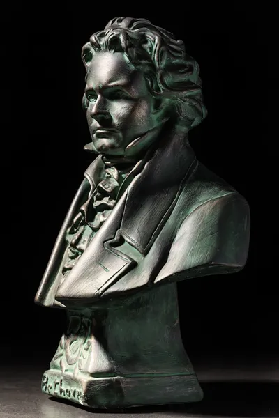 Beethoven sculpture on black background