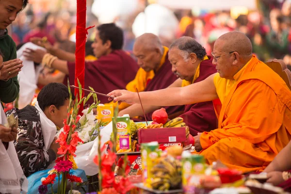 Unidentified tibetan Buddhist monks near stupa Boudhanath