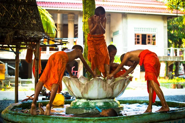 Unidentified monk children play at a Buddhist monastery Wat Klong Prao