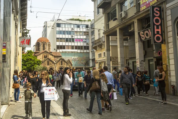 Athenians and tourists in center of city