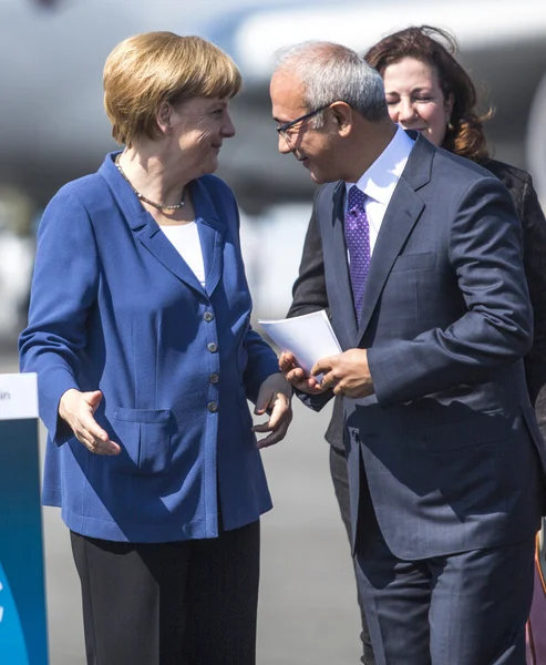 German Chancellor Angela Merkel and Turkish Minister of transport Lutfi Elvan