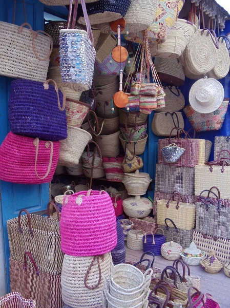 Crafts. Handmade wicker bags, baskets and boxes in a street shop in Essaouira, Morocco.