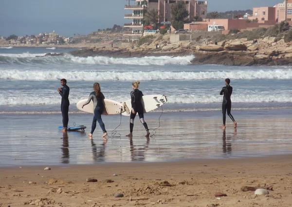 Surf lessons for beginners in Taghazout, Morocco. January, 2013.