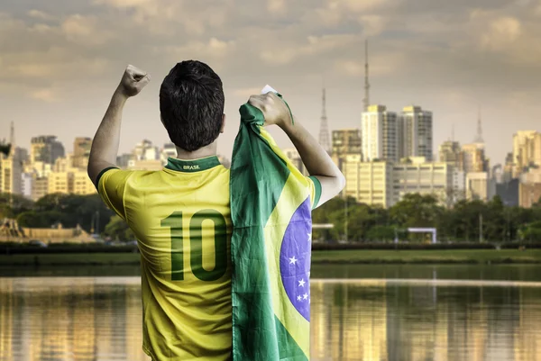 Brazilian fan celebrates the victory in Sao Paulo, Brazil