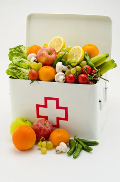 Healthy food. First aid box filled with fruits and vegetables.