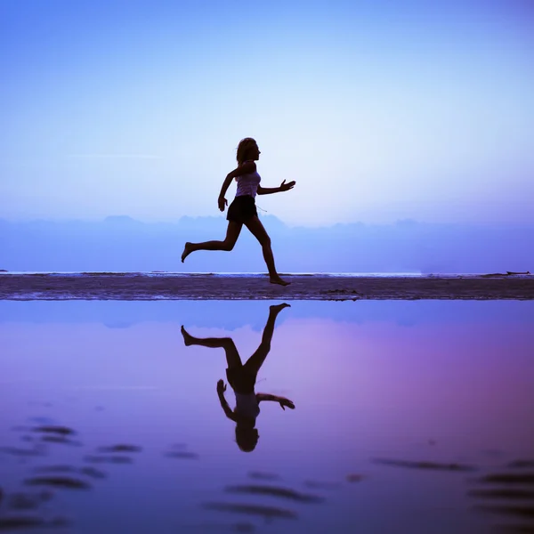 Female runner silhouette