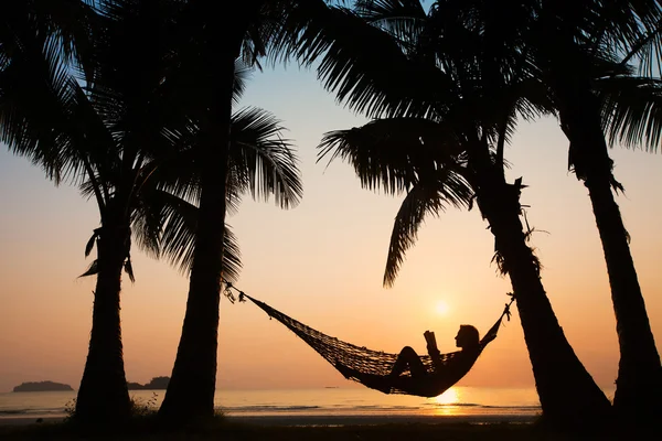 Sunset in hammock on the beach