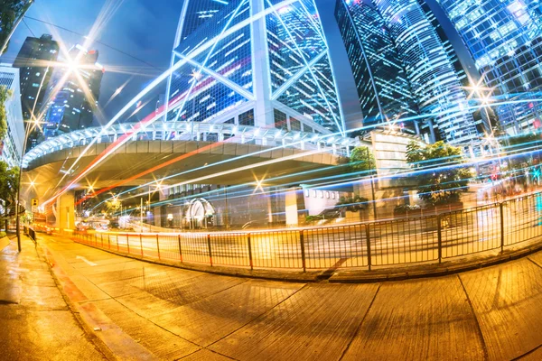 The light trails on the modern building background in hongkong c