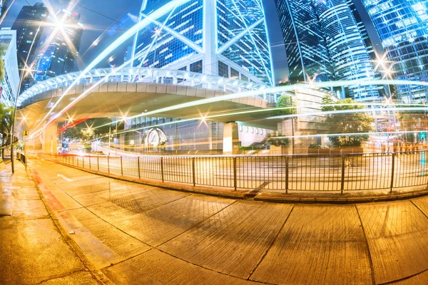 The light trails on the modern building background in hongkong c