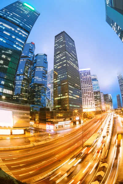 The light trails on the modern building background in hongkong c