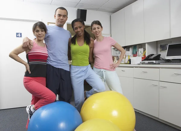 Group portrait of exercise class — Stock Photo #13226733