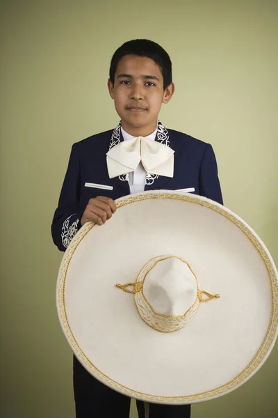 Hispanic boy in traditional clothing