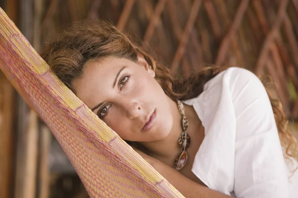 Young woman in a hammock