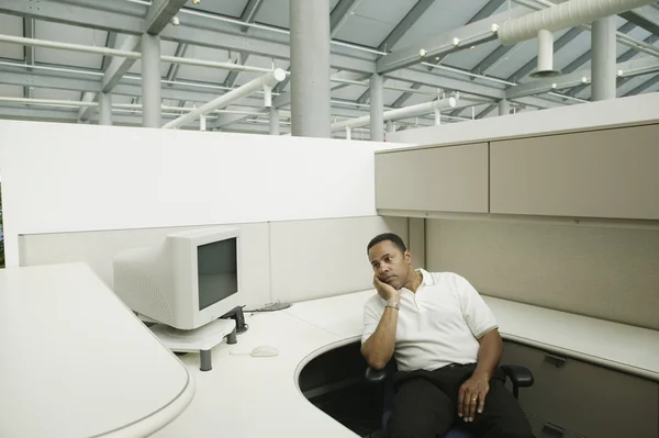 Sad businessman in empty office