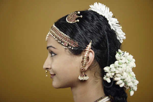 Indian woman wearing traditional facial jewellery